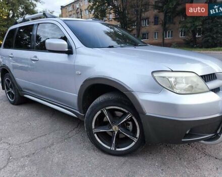 Мицубиси Аутлендер 2006 в Чернигове на Automoto.ua Серый Мицубиси Аутлендер, объемом двигателя 2.4 л и пробегом 147 тыс. км за 6900 $, фото 4 на Automoto.ua