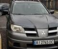 Сірий Міцубісі Аутлендер, об'ємом двигуна 2 л та пробігом 310 тис. км за 5200 $, фото 1 на Automoto.ua