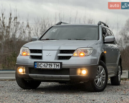 Серый Мицубиси Аутлендер, объемом двигателя 2.38 л и пробегом 204 тыс. км за 6990 $, фото 45 на Automoto.ua