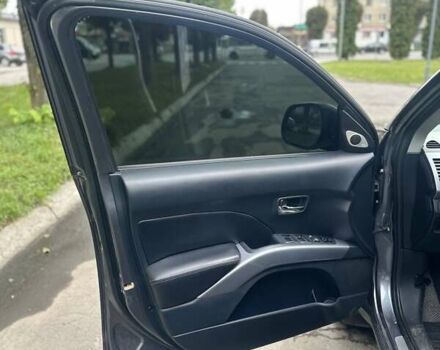 Серый Мицубиси Аутлендер, объемом двигателя 2 л и пробегом 250 тыс. км за 9300 $, фото 8 на Automoto.ua