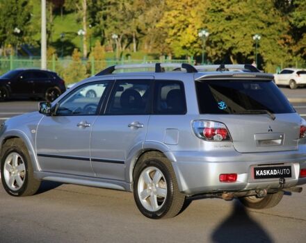 Серый Мицубиси Аутлендер, объемом двигателя 2.4 л и пробегом 200 тыс. км за 8950 $, фото 3 на Automoto.ua