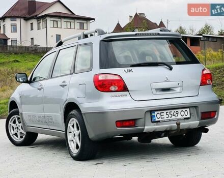 Сірий Міцубісі Аутлендер, об'ємом двигуна 2 л та пробігом 300 тис. км за 5150 $, фото 4 на Automoto.ua