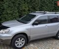 Серый Мицубиси Аутлендер, объемом двигателя 2 л и пробегом 226 тыс. км за 5500 $, фото 1 на Automoto.ua
