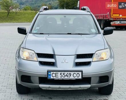 Сірий Міцубісі Аутлендер, об'ємом двигуна 2 л та пробігом 300 тис. км за 5650 $, фото 20 на Automoto.ua