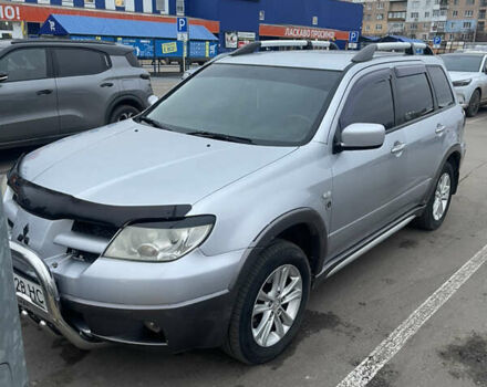 Серый Мицубиси Аутлендер, объемом двигателя 2.4 л и пробегом 307 тыс. км за 4000 $, фото 2 на Automoto.ua