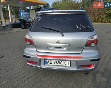 Серый Мицубиси Аутлендер, объемом двигателя 2.4 л и пробегом 243 тыс. км за 6999 $, фото 17 на Automoto.ua