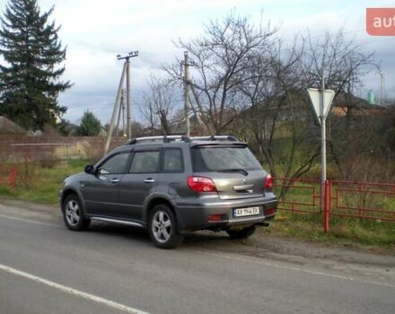 Серый Мицубиси Аутлендер, объемом двигателя 2.4 л и пробегом 235 тыс. км за 6500 $, фото 5 на Automoto.ua