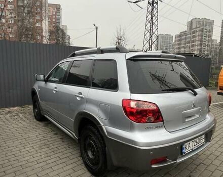 Серый Мицубиси Аутлендер, объемом двигателя 2.4 л и пробегом 179 тыс. км за 7000 $, фото 4 на Automoto.ua