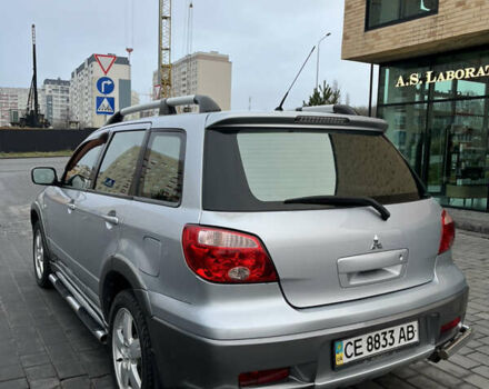 Серый Мицубиси Аутлендер, объемом двигателя 2.38 л и пробегом 180 тыс. км за 6000 $, фото 12 на Automoto.ua