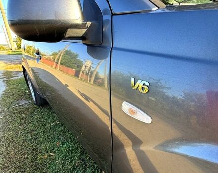 Серый Мицубиси Аутлендер, объемом двигателя 3 л и пробегом 280 тыс. км за 7500 $, фото 2 на Automoto.ua