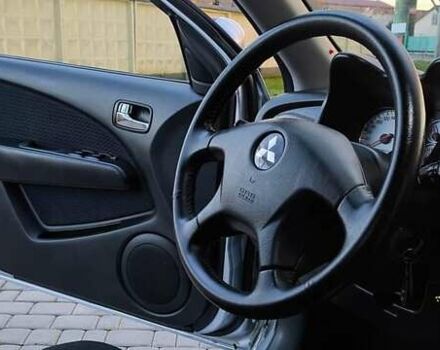 Серый Мицубиси Аутлендер, объемом двигателя 2.38 л и пробегом 228 тыс. км за 7900 $, фото 11 на Automoto.ua