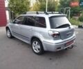 Серый Мицубиси Аутлендер, объемом двигателя 2.4 л и пробегом 200 тыс. км за 8650 $, фото 5 на Automoto.ua