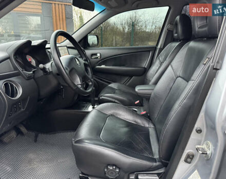 Серый Мицубиси Аутлендер, объемом двигателя 2.38 л и пробегом 204 тыс. км за 6990 $, фото 10 на Automoto.ua