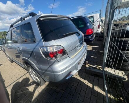 Серый Мицубиси Аутлендер, объемом двигателя 2.4 л и пробегом 220 тыс. км за 3369 $, фото 2 на Automoto.ua