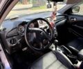 Серый Мицубиси Аутлендер, объемом двигателя 2.38 л и пробегом 260 тыс. км за 5799 $, фото 22 на Automoto.ua
