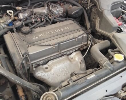 Серый Мицубиси Аутлендер, объемом двигателя 2 л и пробегом 154 тыс. км за 6500 $, фото 15 на Automoto.ua