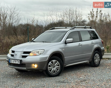 Серый Мицубиси Аутлендер, объемом двигателя 2.38 л и пробегом 204 тыс. км за 6990 $, фото 42 на Automoto.ua