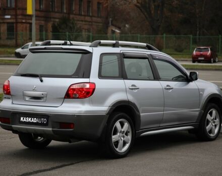 Серый Мицубиси Аутлендер, объемом двигателя 2.4 л и пробегом 171 тыс. км за 8200 $, фото 5 на Automoto.ua