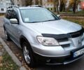 Сірий Міцубісі Аутлендер, об'ємом двигуна 2 л та пробігом 312 тис. км за 8300 $, фото 6 на Automoto.ua