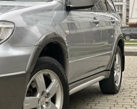 Сірий Міцубісі Аутлендер, об'ємом двигуна 2.4 л та пробігом 98 тис. км за 7199 $, фото 10 на Automoto.ua