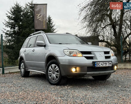 Серый Мицубиси Аутлендер, объемом двигателя 2.38 л и пробегом 204 тыс. км за 6990 $, фото 22 на Automoto.ua