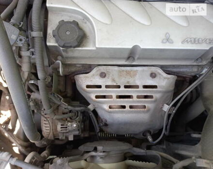 Сірий Міцубісі Аутлендер, об'ємом двигуна 2.38 л та пробігом 214 тис. км за 6500 $, фото 12 на Automoto.ua