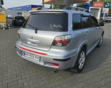 Серый Мицубиси Аутлендер, объемом двигателя 2.4 л и пробегом 243 тыс. км за 6999 $, фото 18 на Automoto.ua
