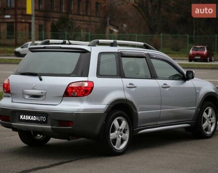 Серый Мицубиси Аутлендер, объемом двигателя 2.4 л и пробегом 171 тыс. км за 8200 $, фото 5 на Automoto.ua