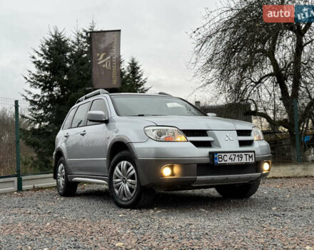 Серый Мицубиси Аутлендер, объемом двигателя 2.38 л и пробегом 204 тыс. км за 6990 $, фото 27 на Automoto.ua