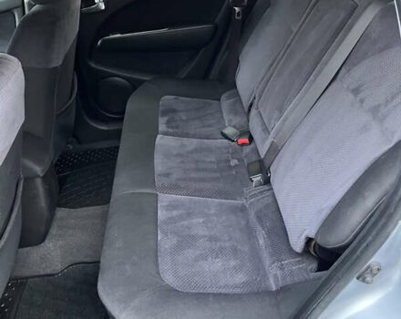 Серый Мицубиси Аутлендер, объемом двигателя 2.38 л и пробегом 180 тыс. км за 6000 $, фото 24 на Automoto.ua