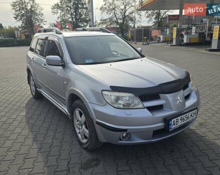 Серый Мицубиси Аутлендер, объемом двигателя 2.4 л и пробегом 243 тыс. км за 6999 $, фото 22 на Automoto.ua
