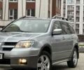 Сірий Міцубісі Аутлендер, об'ємом двигуна 2.4 л та пробігом 98 тис. км за 7199 $, фото 2 на Automoto.ua