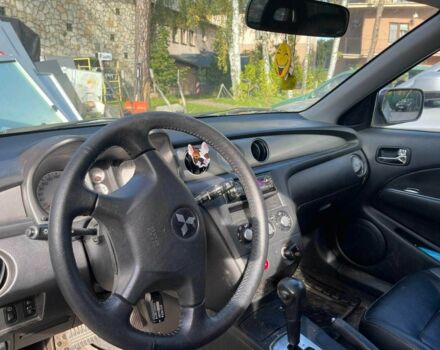 Серый Мицубиси Аутлендер, объемом двигателя 2.4 л и пробегом 127 тыс. км за 4400 $, фото 5 на Automoto.ua