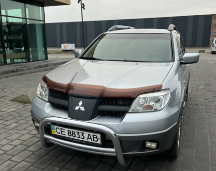 Серый Мицубиси Аутлендер, объемом двигателя 2.38 л и пробегом 180 тыс. км за 6000 $, фото 15 на Automoto.ua