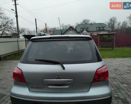 Сірий Міцубісі Аутлендер, об'ємом двигуна 2.4 л та пробігом 98 тис. км за 6800 $, фото 1 на Automoto.ua