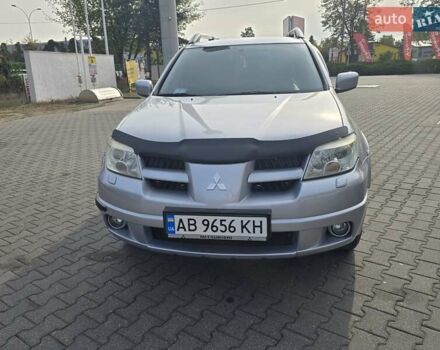 Серый Мицубиси Аутлендер, объемом двигателя 2.4 л и пробегом 243 тыс. км за 6999 $, фото 24 на Automoto.ua