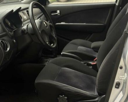 Сірий Міцубісі Аутлендер, об'ємом двигуна 2.4 л та пробігом 98 тис. км за 7199 $, фото 61 на Automoto.ua