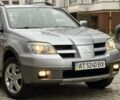 Сірий Міцубісі Аутлендер, об'ємом двигуна 2.4 л та пробігом 98 тис. км за 7199 $, фото 20 на Automoto.ua