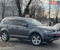 Серый Мицубиси Аутлендер, объемом двигателя 3 л и пробегом 157 тыс. км за 8500 $, фото 1 на Automoto.ua