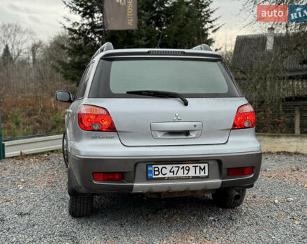 Серый Мицубиси Аутлендер, объемом двигателя 2.38 л и пробегом 204 тыс. км за 6990 $, фото 30 на Automoto.ua