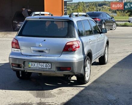 Сірий Міцубісі Аутлендер, об'ємом двигуна 2 л та пробігом 214 тис. км за 4500 $, фото 2 на Automoto.ua