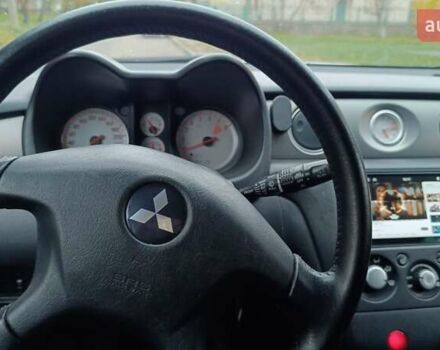 Сірий Міцубісі Аутлендер, об'ємом двигуна 2 л та пробігом 312 тис. км за 8300 $, фото 14 на Automoto.ua