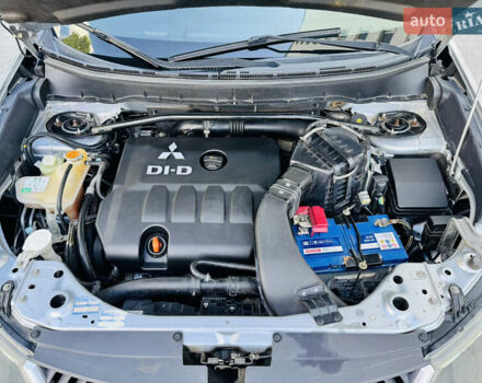 Серый Мицубиси Аутлендер, объемом двигателя 2 л и пробегом 179 тыс. км за 9500 $, фото 16 на Automoto.ua