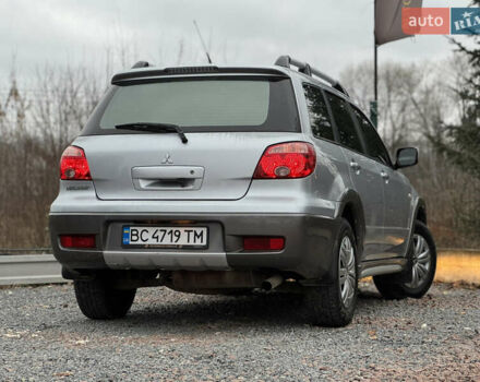 Серый Мицубиси Аутлендер, объемом двигателя 2.38 л и пробегом 204 тыс. км за 6990 $, фото 39 на Automoto.ua