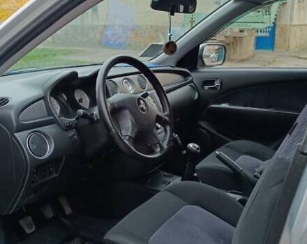 Сірий Міцубісі Аутлендер, об'ємом двигуна 2 л та пробігом 312 тис. км за 8300 $, фото 1 на Automoto.ua