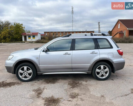 Серый Мицубиси Аутлендер, объемом двигателя 2.4 л и пробегом 264 тыс. км за 6300 $, фото 3 на Automoto.ua