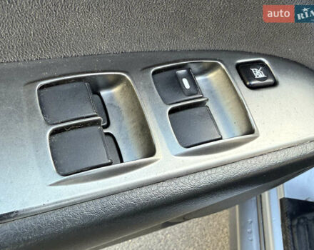 Сірий Міцубісі Аутлендер, об'ємом двигуна 2 л та пробігом 235 тис. км за 5200 $, фото 25 на Automoto.ua