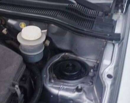 Серый Мицубиси Аутлендер, объемом двигателя 2.4 л и пробегом 261 тыс. км за 5700 $, фото 1 на Automoto.ua