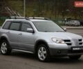 Серый Мицубиси Аутлендер, объемом двигателя 2.4 л и пробегом 171 тыс. км за 8200 $, фото 2 на Automoto.ua