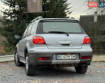 Серый Мицубиси Аутлендер, объемом двигателя 2.38 л и пробегом 204 тыс. км за 6990 $, фото 32 на Automoto.ua